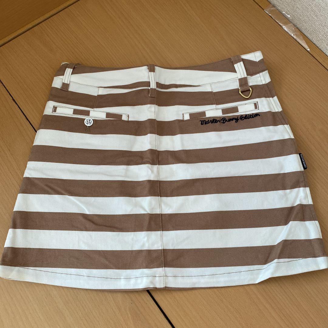 即購入OK 新品 パーリーゲイツ ゴルフ スカート ボーダー 1 ベージュ 白