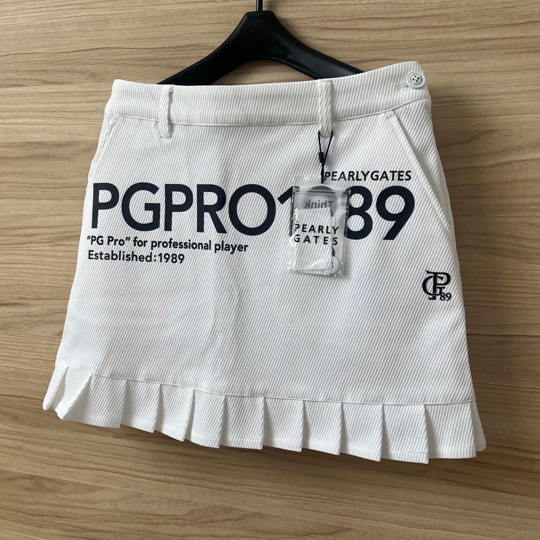新品★46,200円 パーリーゲイツ ゴルフセットアップ ハイネック＆スカート白
