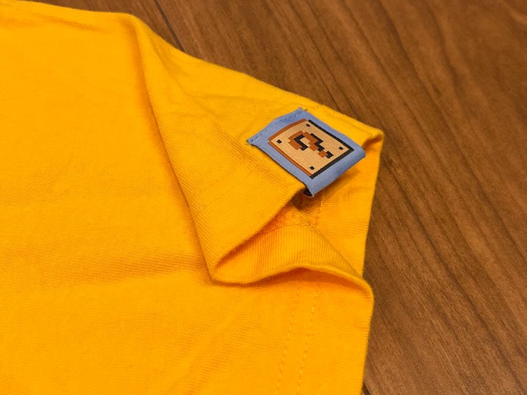 任天堂 TOKYO オフィシャル Tシャツ スーパーマリオブラザーズ オレンジS