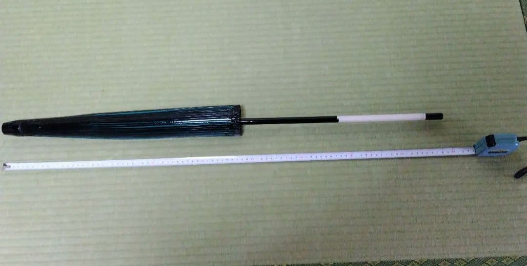 舞踊傘 桐-6703 黒塗り骨と無地の緑色