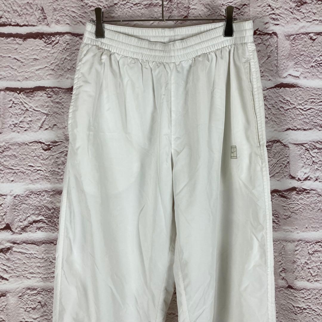 p41 NIKE ホワイト ウィンドブレーカー パンツ　L