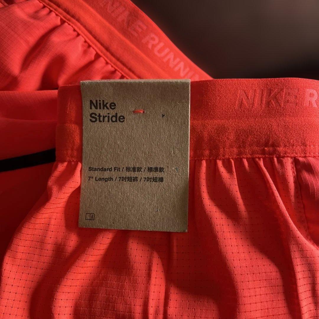 新品タグ付き　Nike ランニングショーツ オレンジ　 Mサイズ