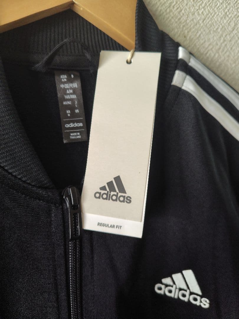 adidas レディース未使用タグ付きブラックジャージ上下セット【Ｌ】