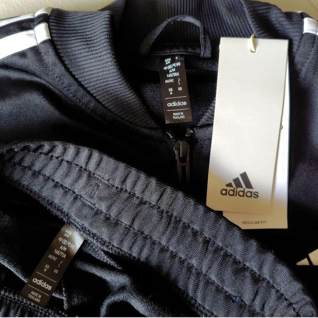adidas レディース未使用タグ付きブラックジャージ上下セット【Ｌ】