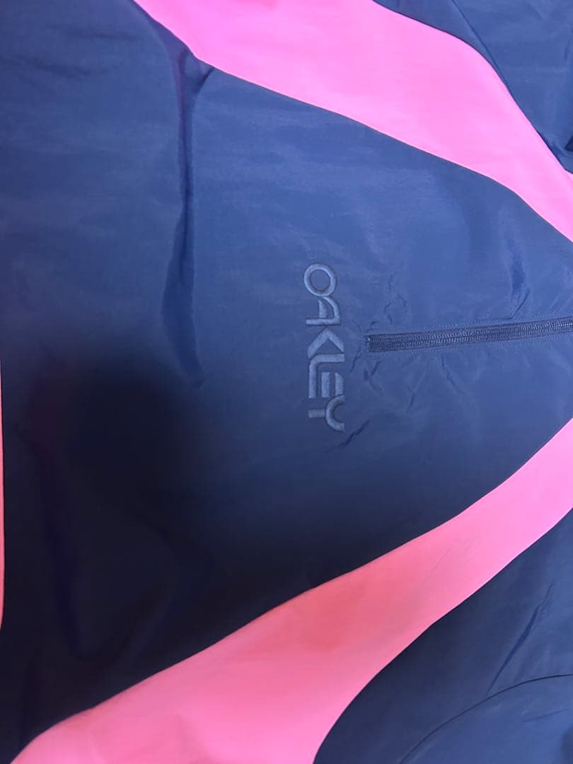 早い者勝ち! 新品未使用 OAKLEY フード付きウィンドブレーカー Lサイズ