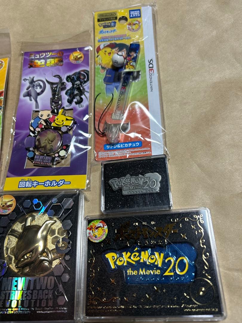 ポケモン 映画限定 グッズ 20周年記念劇場メダル ピンズ キーホルダー