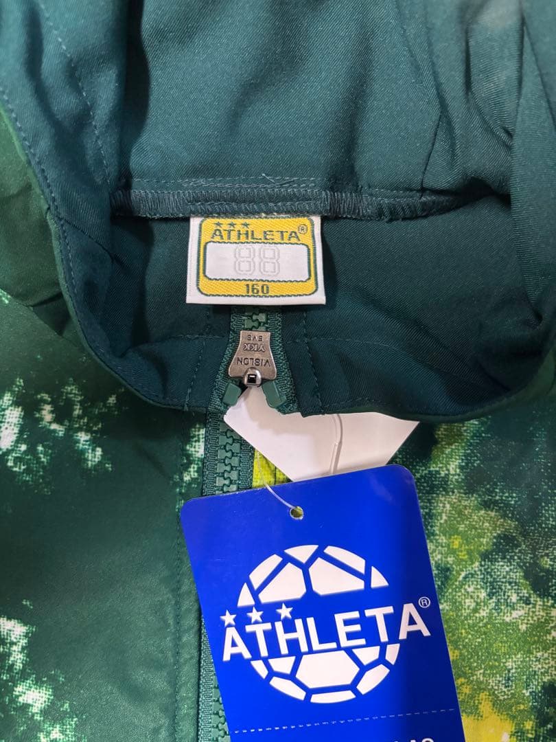 ATHLETA ピステ・ウィンドブレーカー