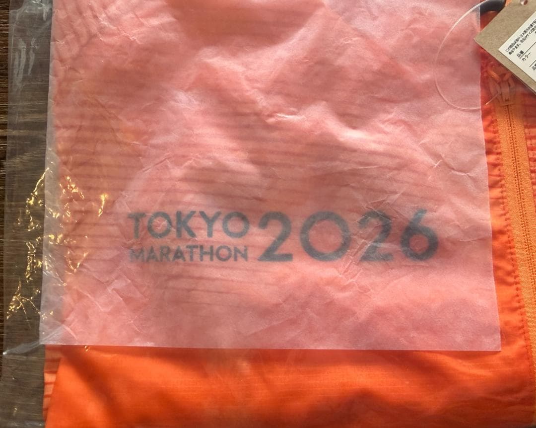 ASICS 東京マラソン2026 RUN TOKYOウィンドブレーカーオレンジM