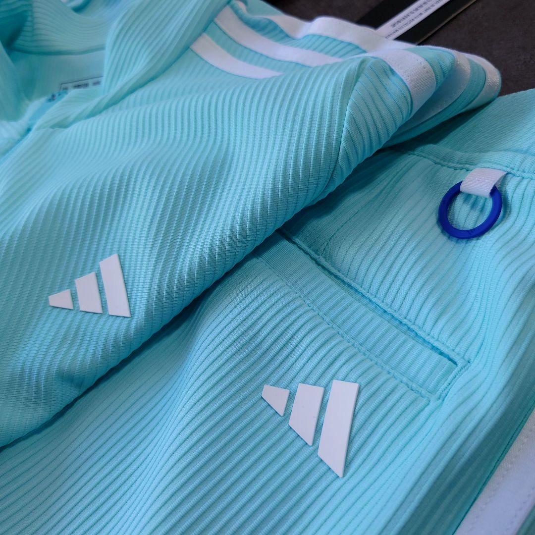 新品 adidas golf セットアップ モックネック リブ素材 クリアアクア