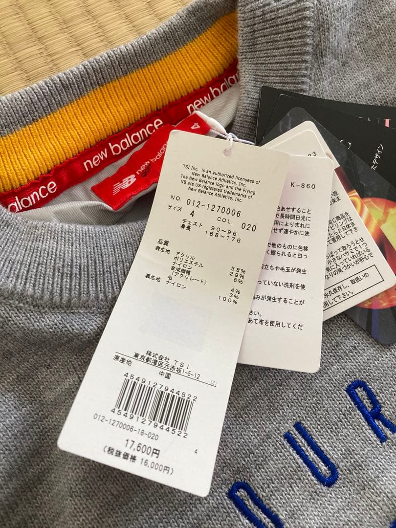 【値下げ】New Balance撥水 クルーネックニット 防⾵ストレッチ総裏仕様