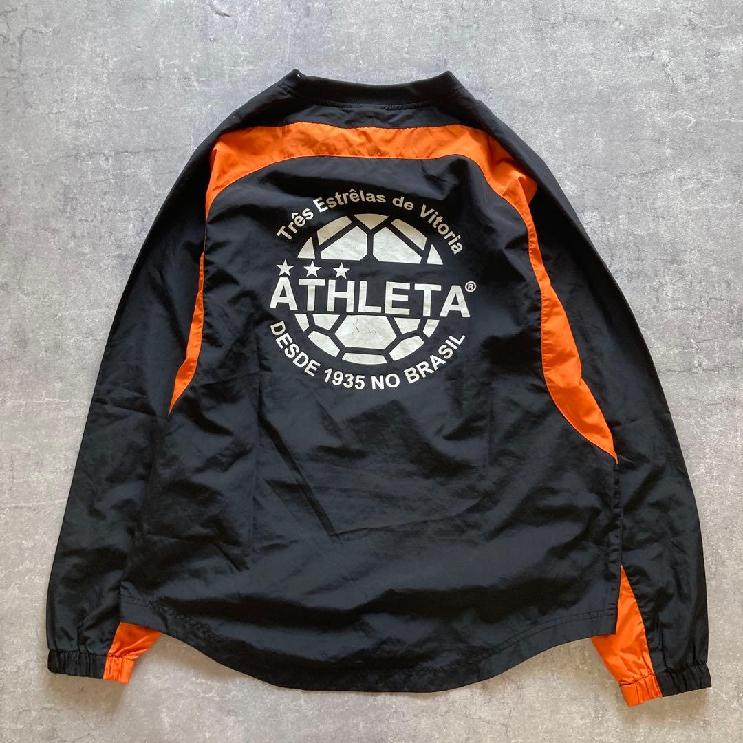 ATHLETA ピステ上下 セットアップ　オレンジ/ブラック　Lサイズ