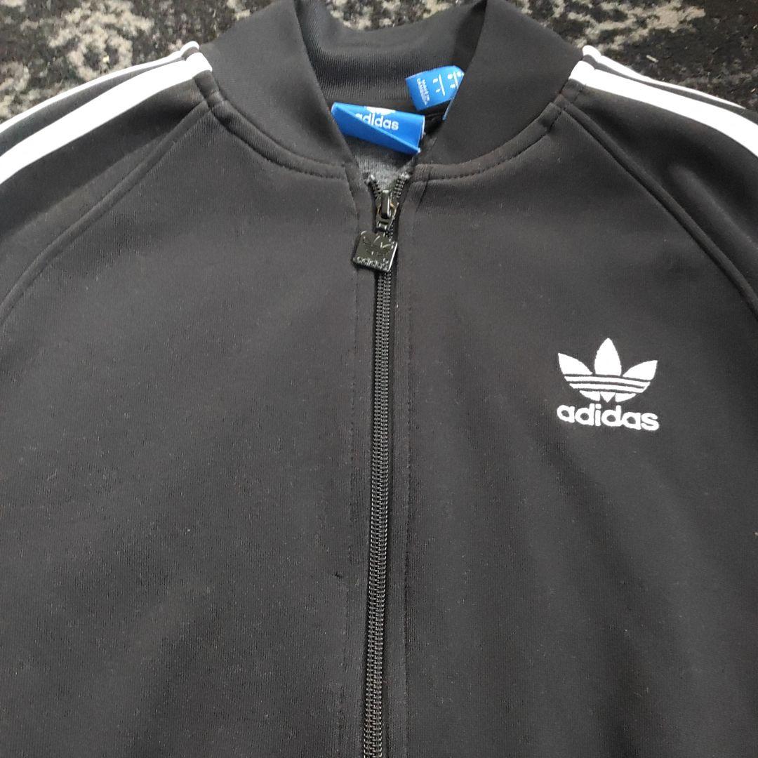 adidasトラックジャケット ストライプ フルジップジャケット　ウィメンズ
