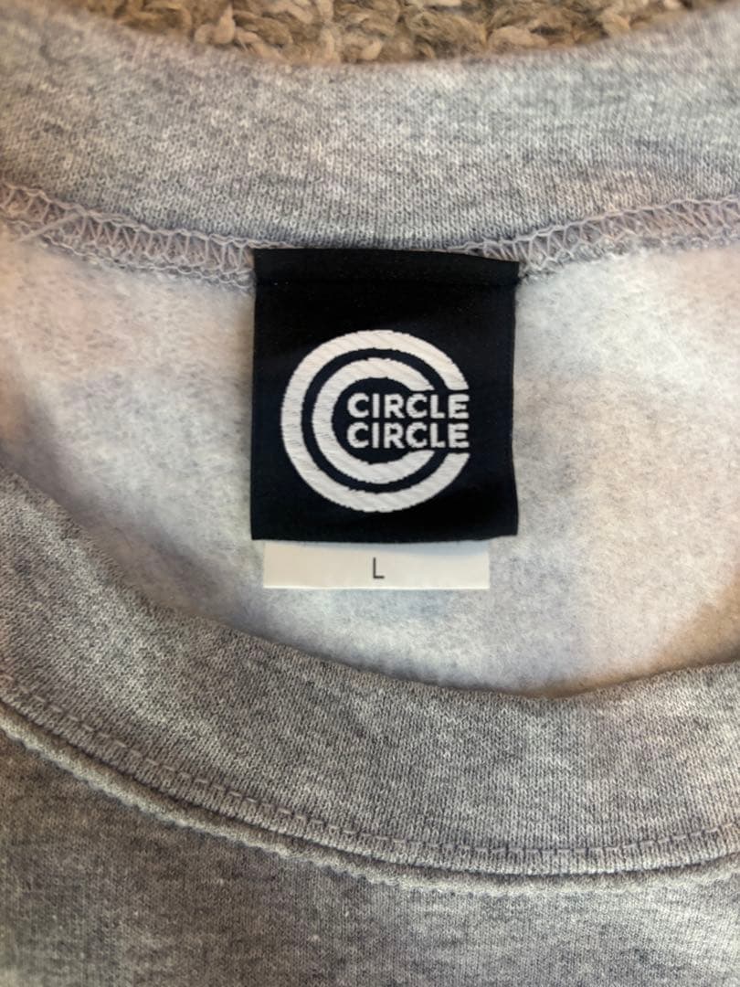 ウ*ー様 CIRCLE CIRCLE グレー スウェット Lサイズ
